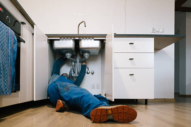 Professional Plumbing technician working in Manns Choice, PA